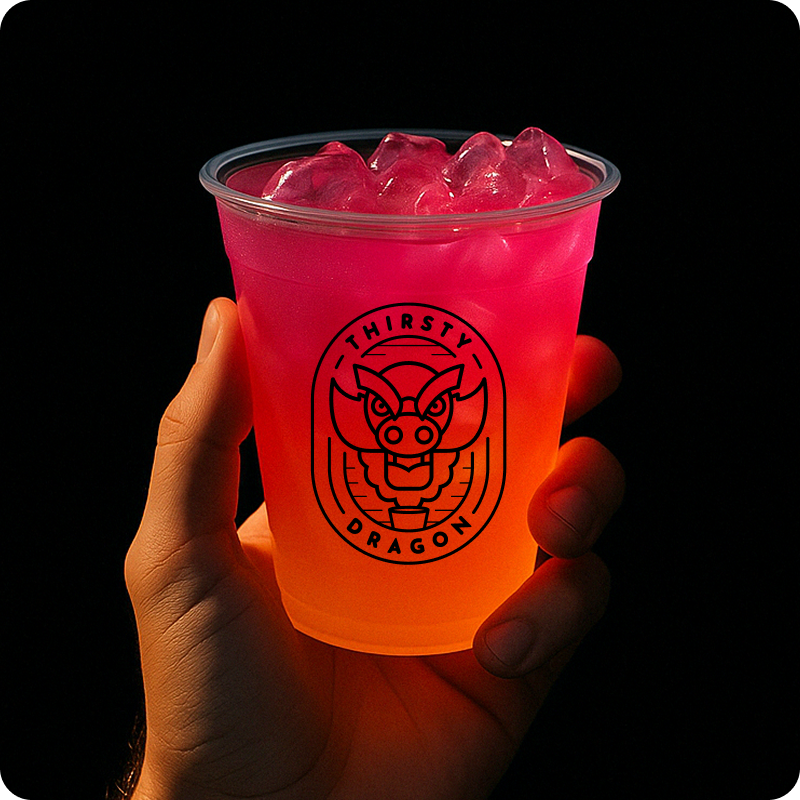 Hand holding an iced Thirsty Dragon drink